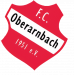 Ein rotes Wappen mit den Aufschriften F.C. Oberarnbach 1951 e.V.